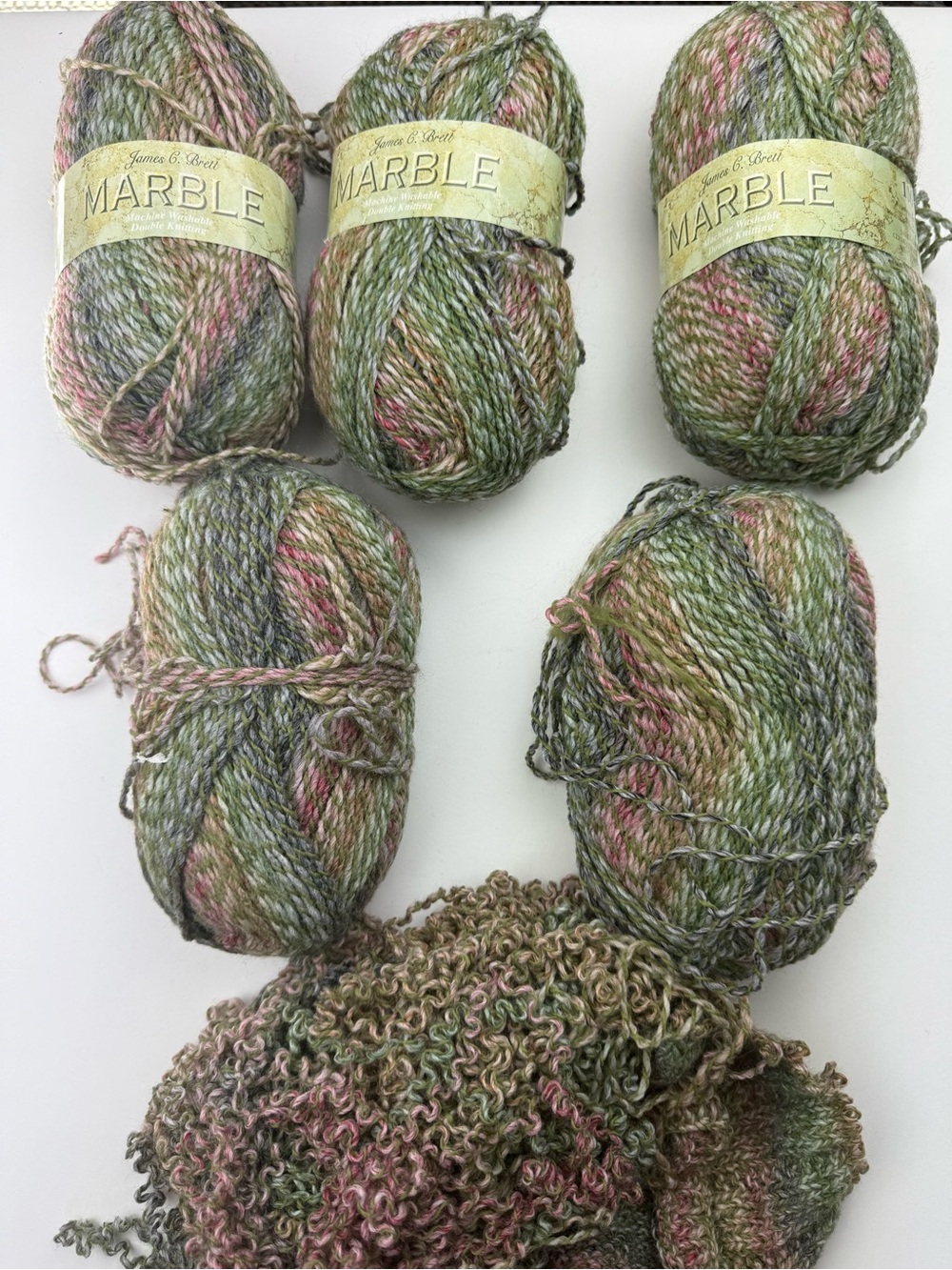 6 skeins of James C. Brett “Marble” yarn